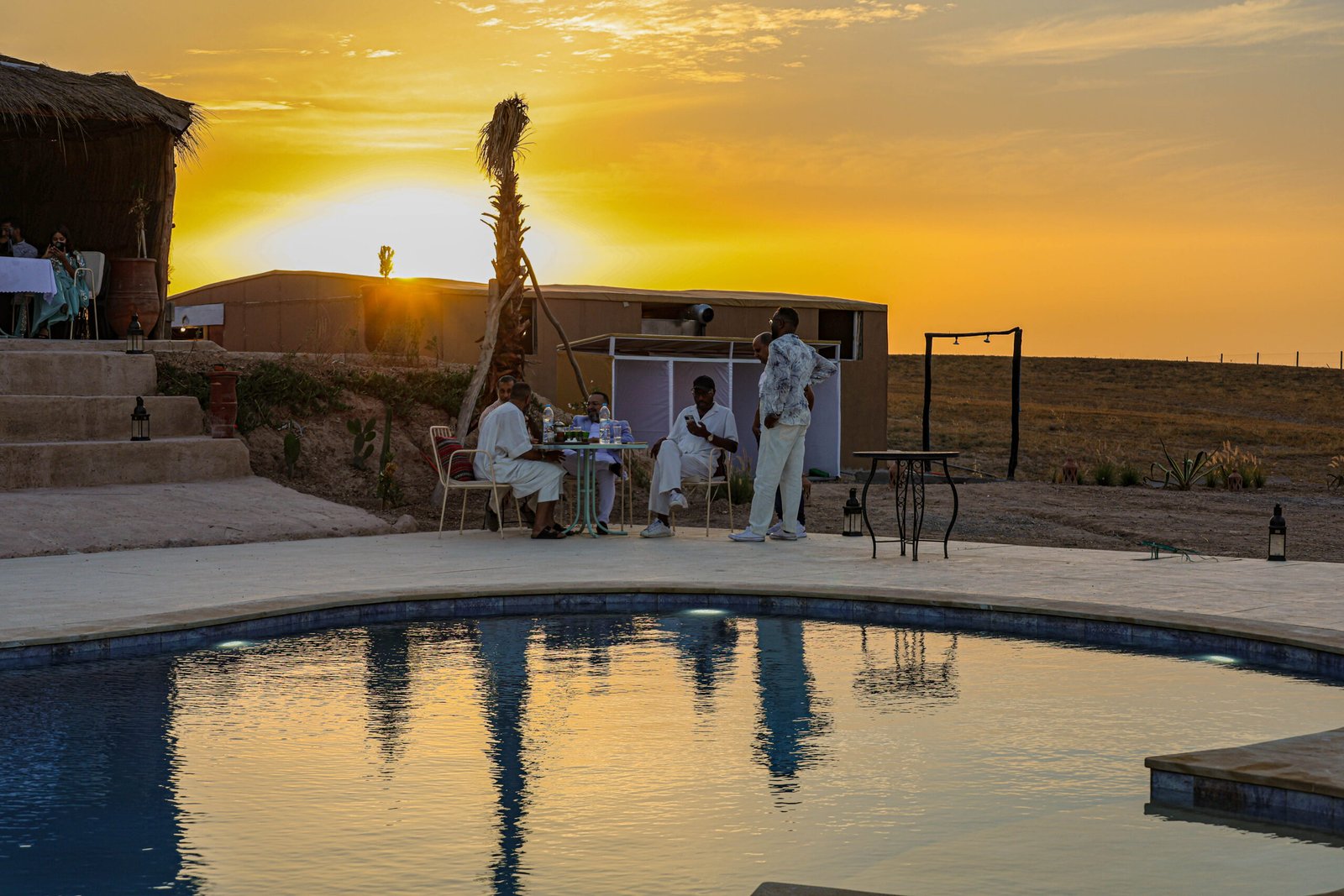 Sunset over the pool at Agafay Palm